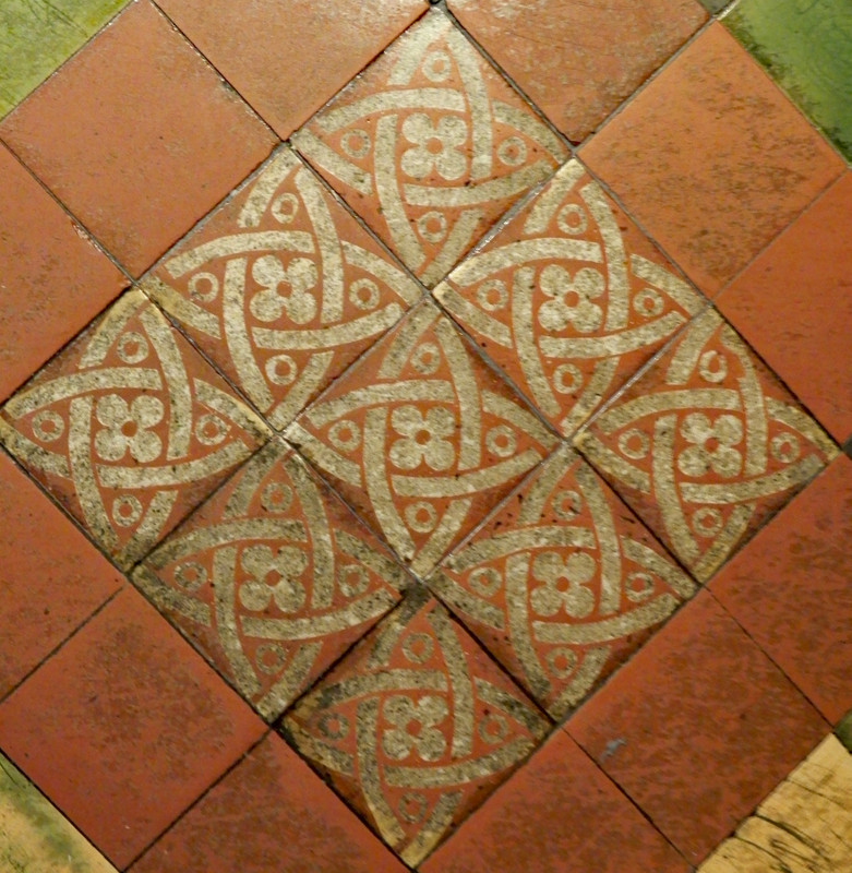 Ceramic floor tiles in an aisle 