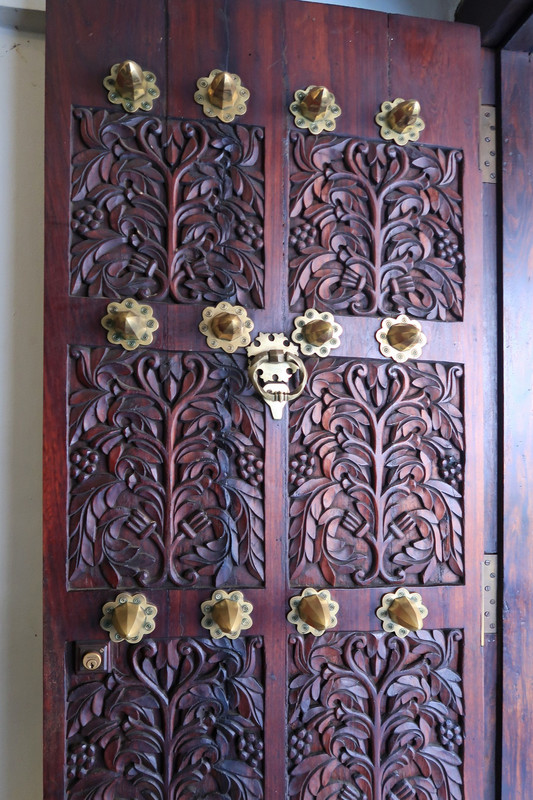 Carved entrance door to Mara Mara Hotel  