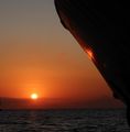 Sunset shines on a dhow 