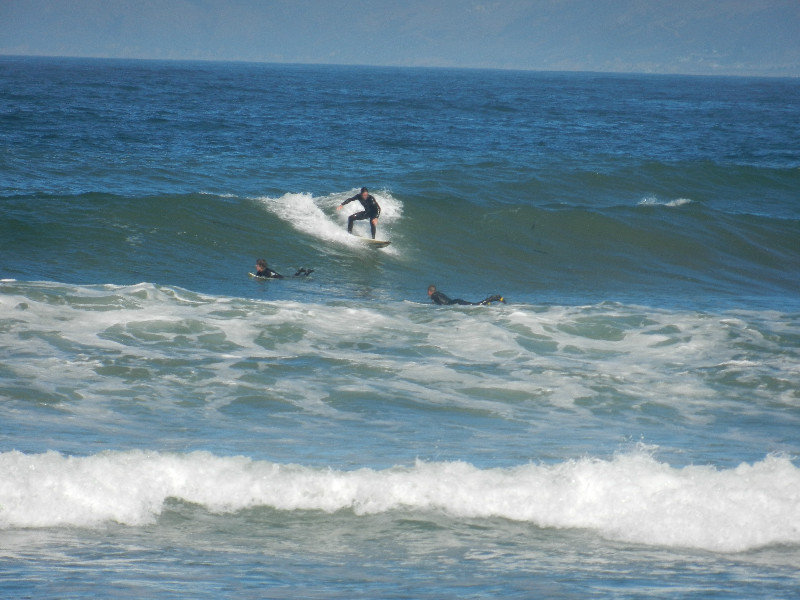 Surfers bij Morro Bay