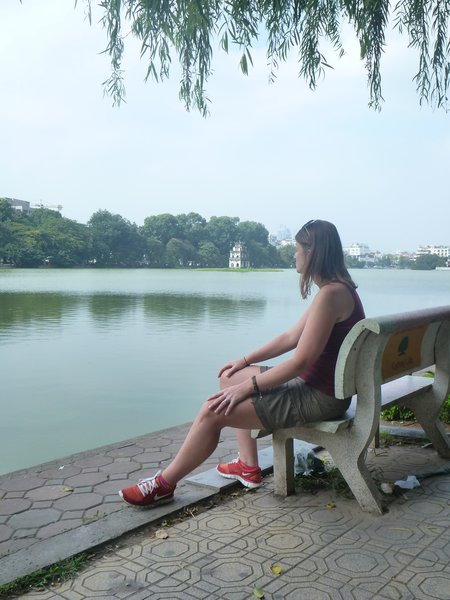 Sara taking a rest by Hoan Kiem lake