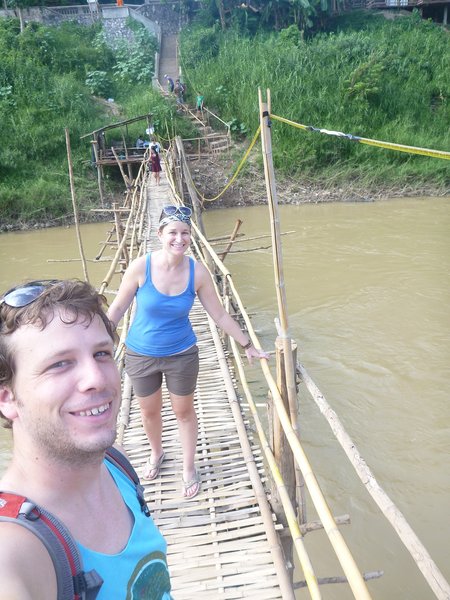 Crossing the bamboo bridge across the Nam Khan