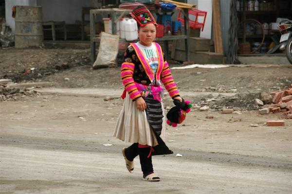 In northern Vietnam it seems as if the local ethnic minorities are putting on a show for tourist with their dress. But they aren't. All the minority women wear mostly traditional gear it seems