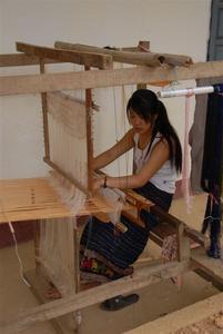 Weaving outside our Xam Tai guesthouse