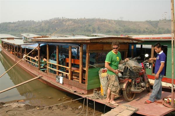 Loading the bikes onto the backpacker boat