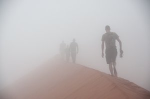 Walking to the top of Dune 45 after getting up at 4am to catch the sunrise, waited but the fog didn't clear!! Haha.