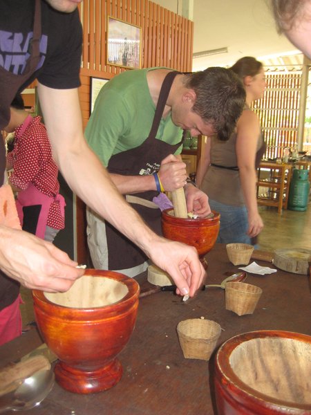 Working the pestle and mortar