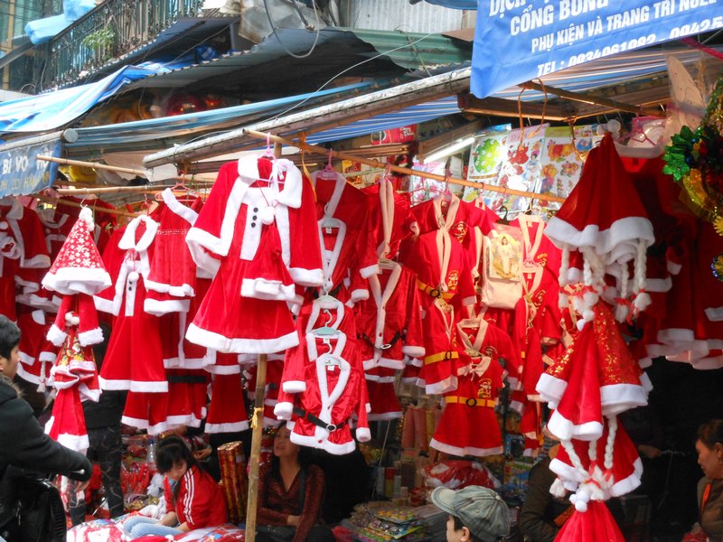 Santa outfits for sale on Hanoi's "holiday" themed street