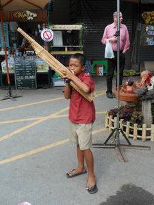 Talented little boy at the Bangkok weekend market