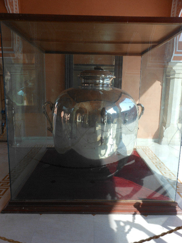One of a Set of Two Silver Urns 