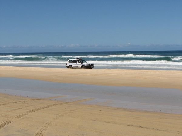 even the police can't resist Fraser Island.