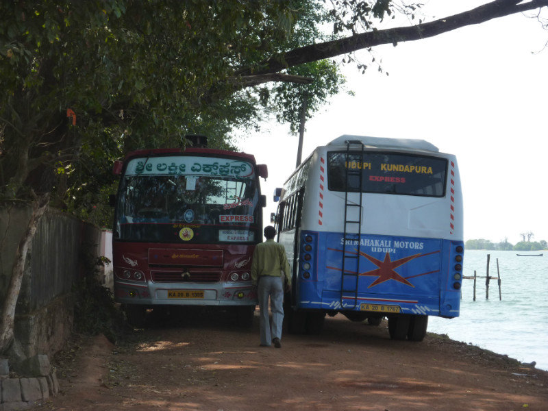 2 coaches passes on a very narrow road down by the river!!!