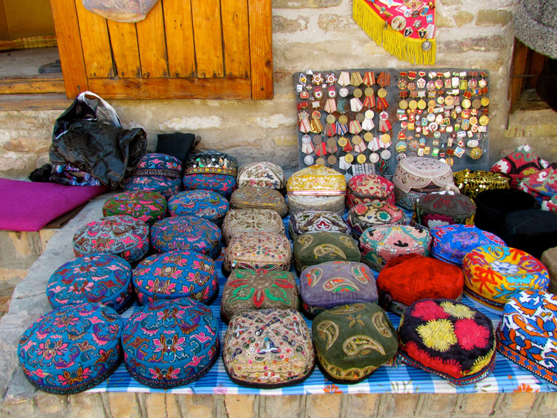 Uzbekistan, Bukhara Hat Vendor 
