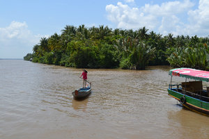 Mekong River -  sampan comes to collect us