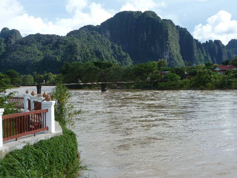 Vang Vieng - View across river, once the scenery re-emerged from the mist