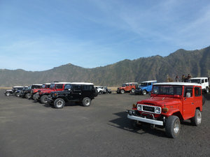 Bromo - colourful Jeeps on the sand