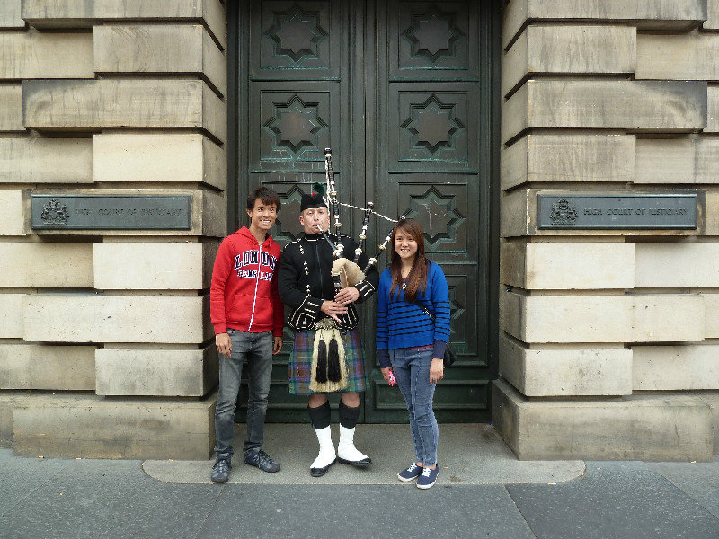 Mandatory photo with the Scottish bagpiper