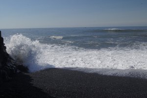 Crashing waves at the black beach