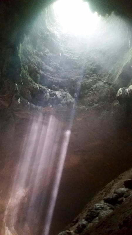 Sun rays shining through into the cave