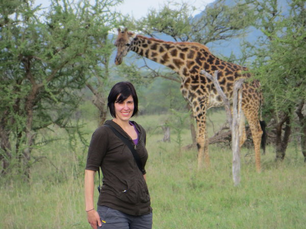 Anne and giraffe at camp