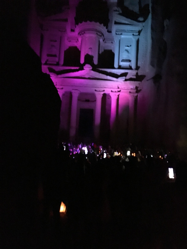 Emerging from the narrow passage we see Petra Treasury at night