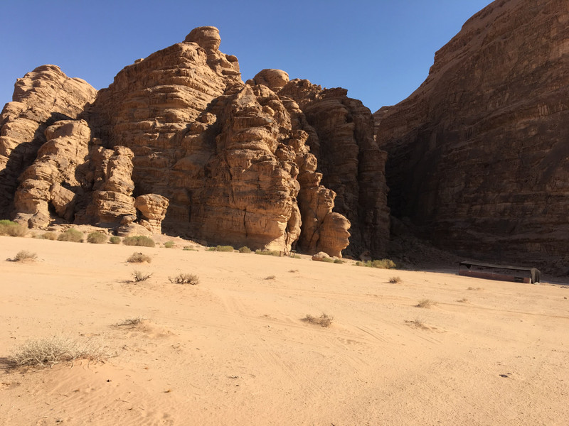 Bust in desert rock