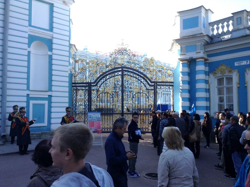 the palace gate is ornate