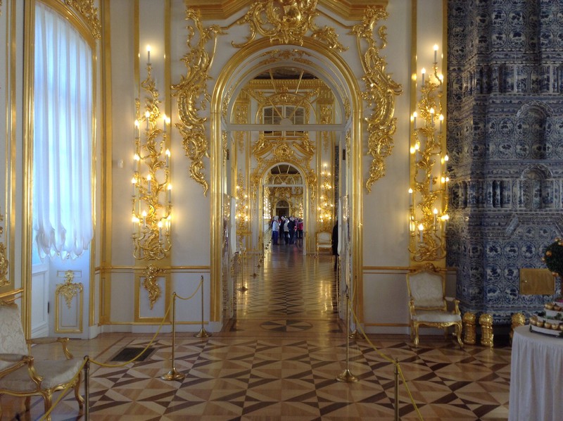 endless doors in golden corridor