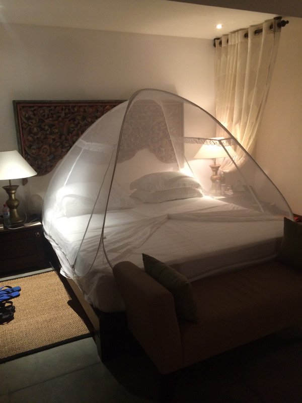  Glamping at Aditya Resort - our bed under a mosquito net Tent