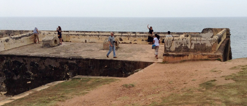 Lesley waves on Galle Fort ramparts