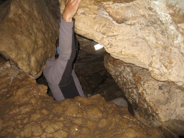 Phil descending through boulders