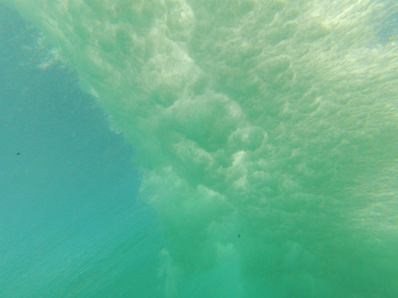 Underwater view of a breaking wave
