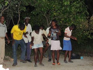 Mokoro polers dancing and singing