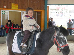 Ava Rides a Horse