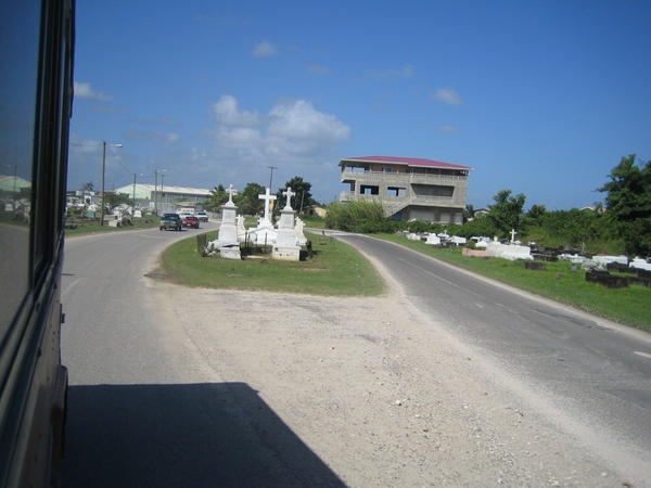 A cemetery in the middle of the road