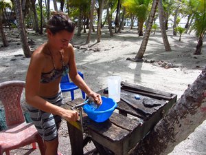 Grinding the coconut