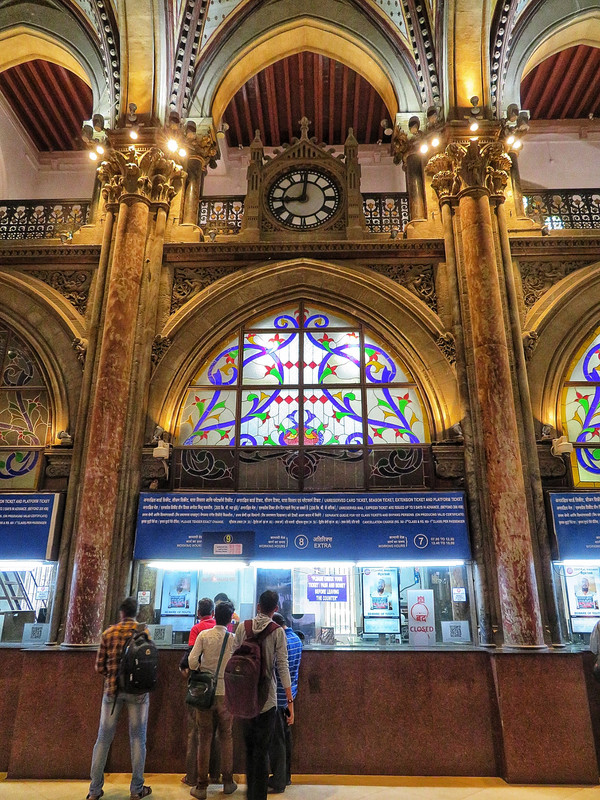 CST Station - the lovely stained glass windows above the ticket counter