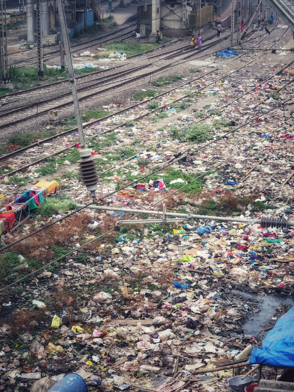 Unbelievable amount of garbage lying alongside the train tracks at Mahim East