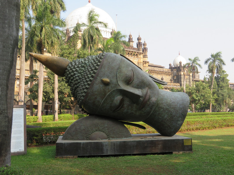Huge Buddha head in gardens of Mumbai Museum