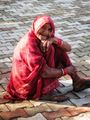 Old Woman sitting at the Jain Temples