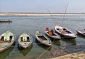 Row boats moored along the ghats