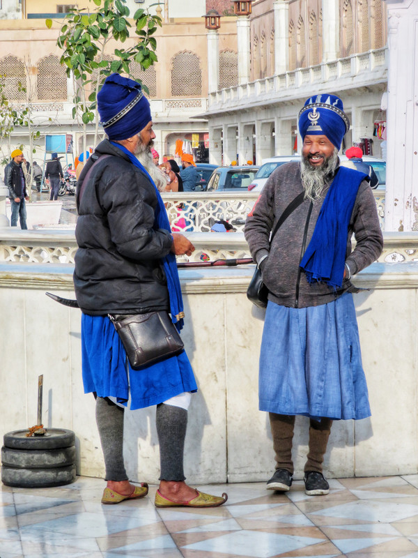Men Dressed in Blue