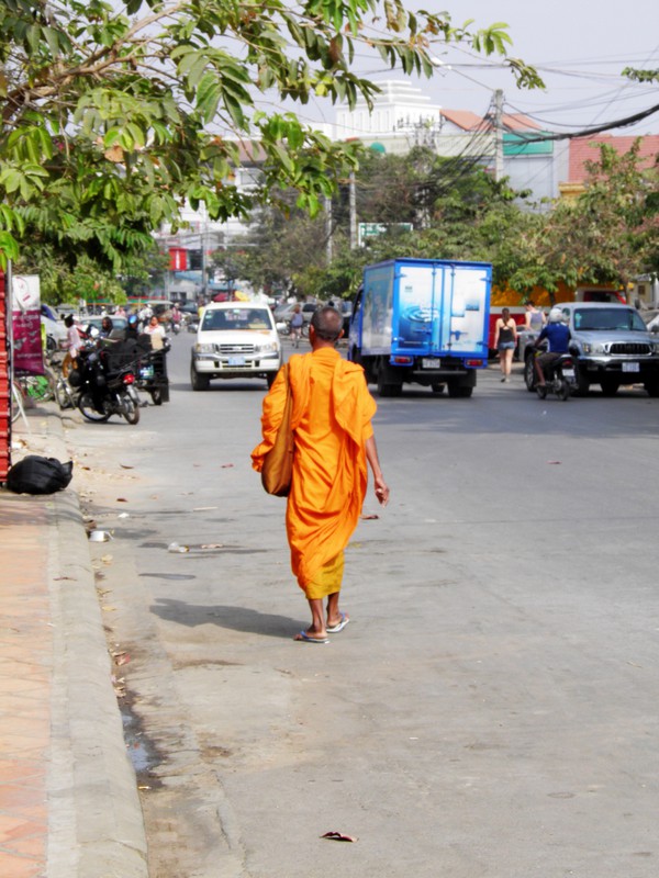 A monk walking in the street