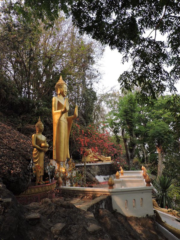 Gilded buddhas on Phu Si