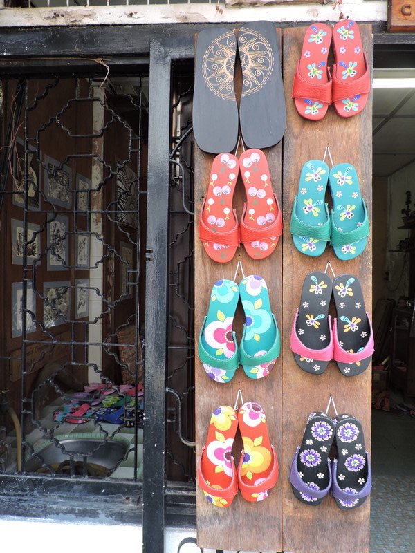 Colourful shoe display outside a shop