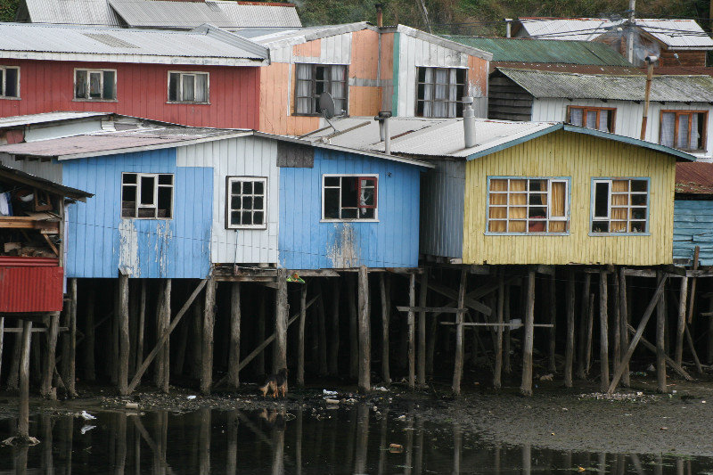 Chiloe houses, hanging on wooden pillards