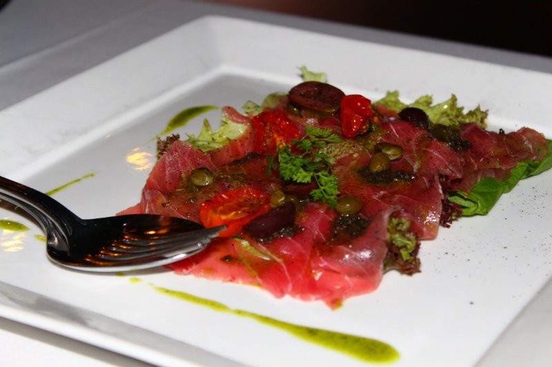 Tuna carpaccio with olive and capers 