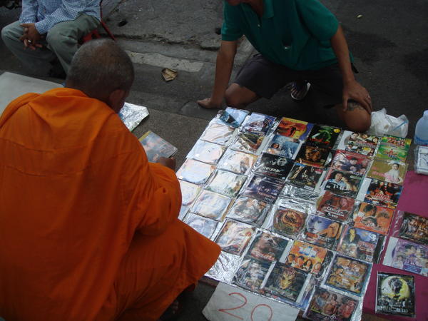 Monks buying fake DVDs