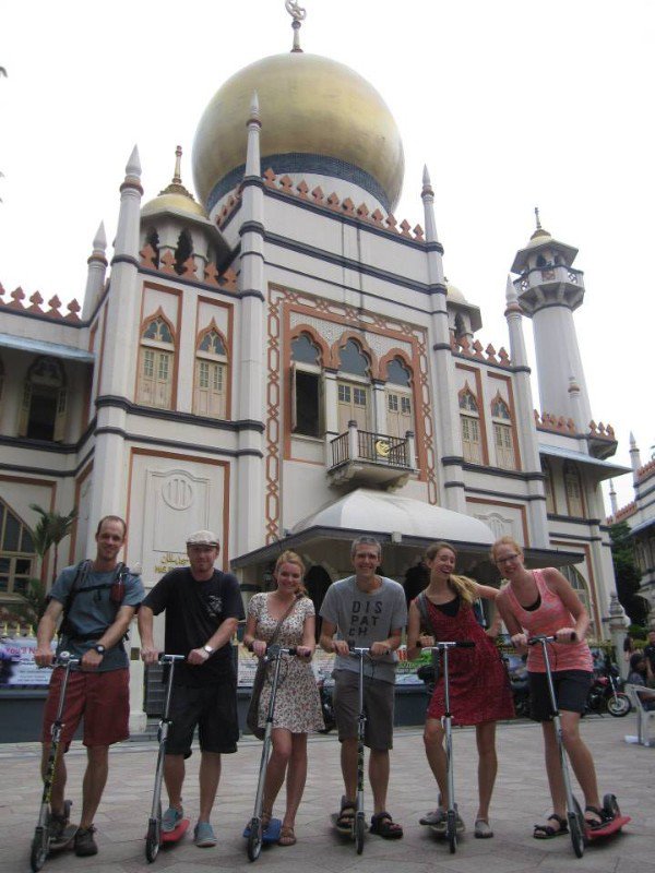 Outside Sultan Mosque on our scooters, Arab Street, Singapore