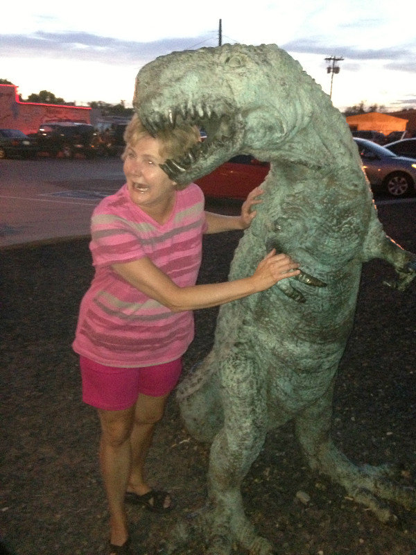 Dinosaur eats Cynde's Head